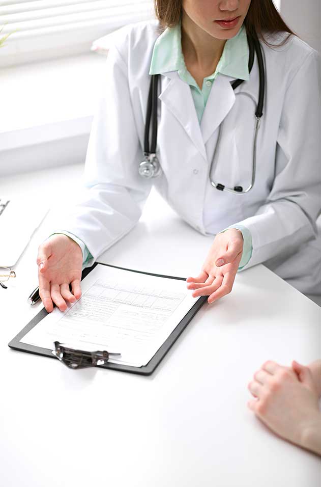 a doctor explaining a medicare form